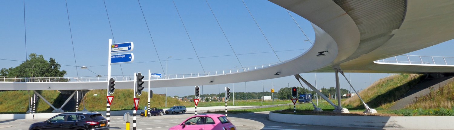 Hovenring Einhoven in daylight, cycle bridge with pilar above higway